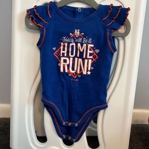 Mets onesie.  “Today Will Be A Home Run!”